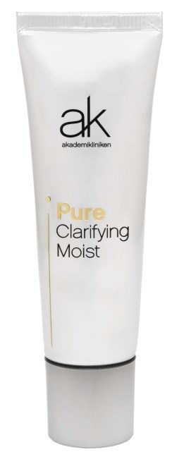 En vit tub med svart och guld text, märkt "Pure Clarifying Moist" av ak. Det är en hudvårdsprodukt.