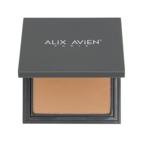 En liten dosa med beige puder, märkt Alix Avien Paris, inuti ett svart skal med lock.