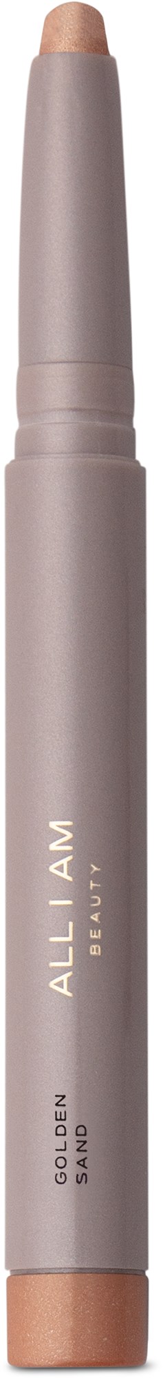 En beige sminkpenna med lock, märkt 'ALL I AM' från Beauty och 'GOLDEN SPICE'.