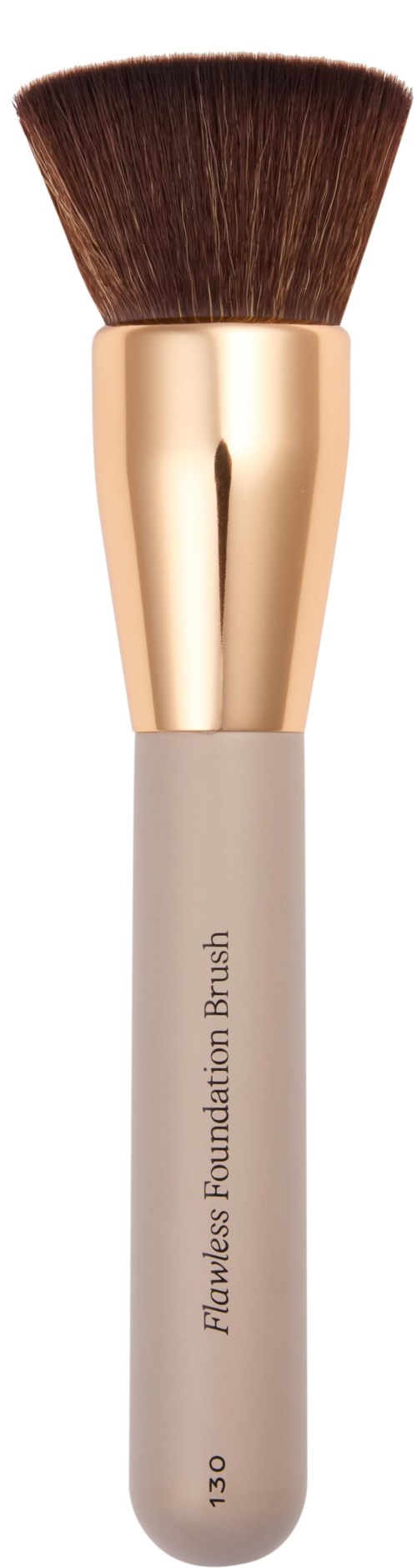 A makeup brush with brown bristles, a gold and white handle, labeled 'Flawless Foundation Brush'.