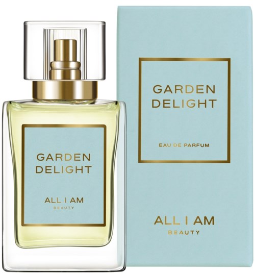 En parfyllare märkt 'Garden Delight' med ljusgul vätska, bredvid en matchande ljusblå box.