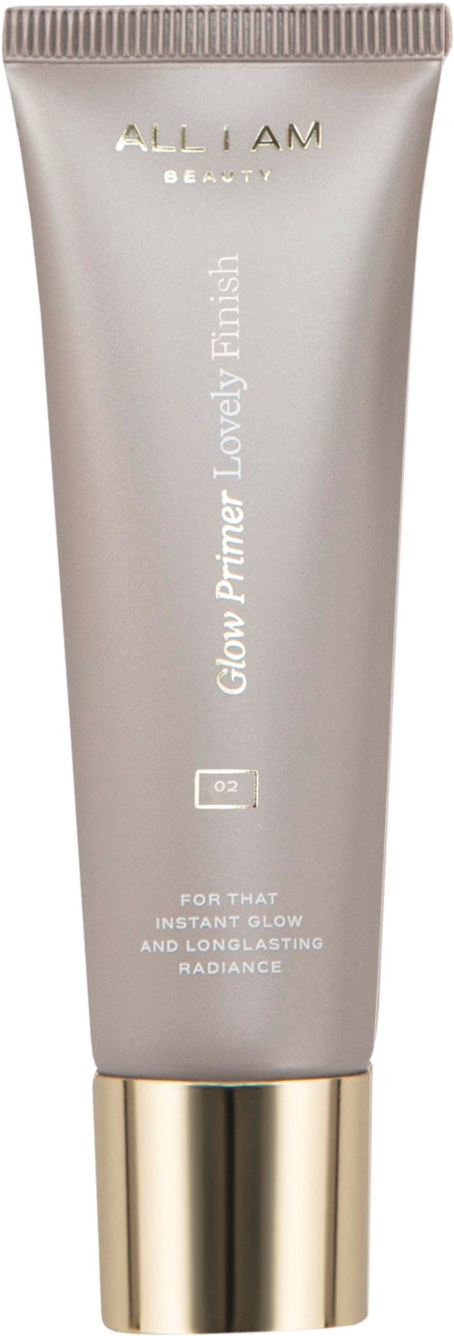 Ett silvrigt rör med guldlock, märkt 'ALL I AM BEAUTY Glow Primer. Lovely Finish'.