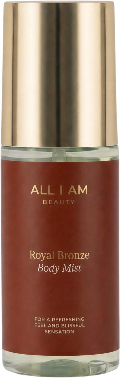 Eine Körpersprayflasche mit Goldkappe, gekennzeichnet All I Am Beauty Royal Bronze, für erfrischende Haut und ein gutes Gefühl.