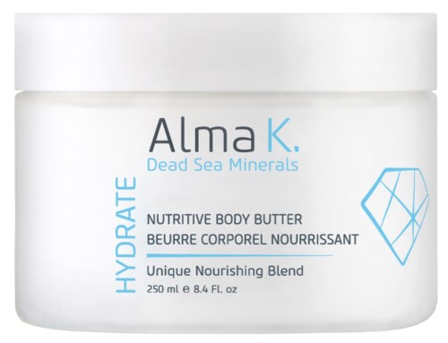En hvit krukke med Alma K. Dead Sea Minerals Hydra Nutritive Body Butter med blå tekst og en blå edelstenslogo.