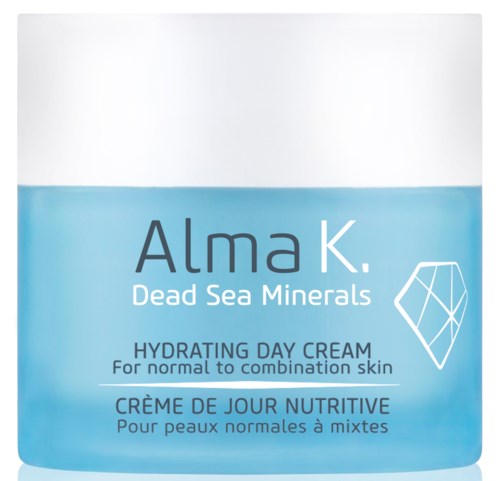 Biała i niebieska puszka z napisem 'Alma K Dead Sea Minerals Hydrating Day Cream'.