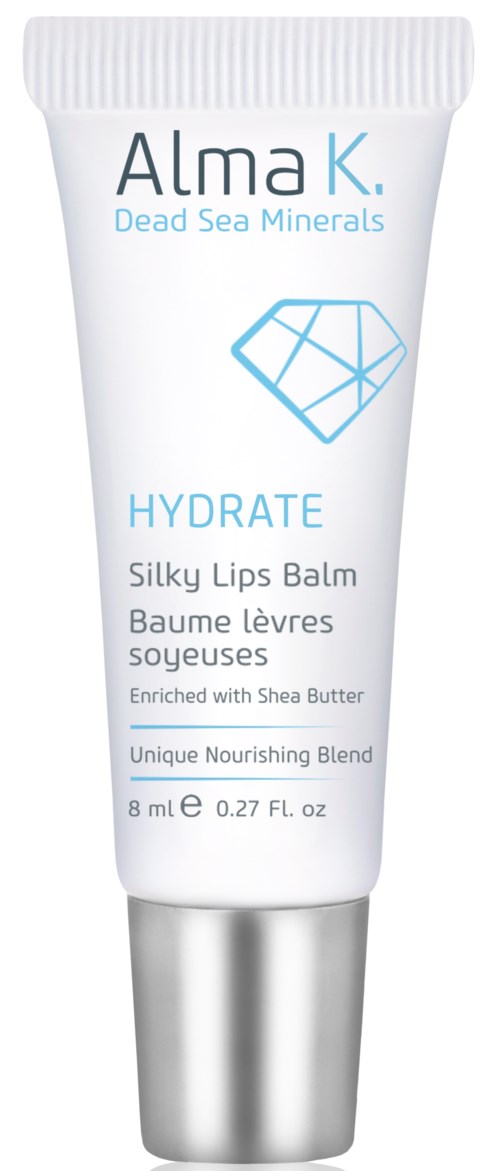 En hvit tuber med lip balm og sølvfarget hette, kalt Alma K. Dead Sea Minerals Hydrate, beriket med Sheasmør.