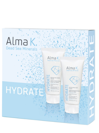 En blå låda innehåller två krämtuber med märket 'Alma K' och ordet 'Hydrate' på dem.