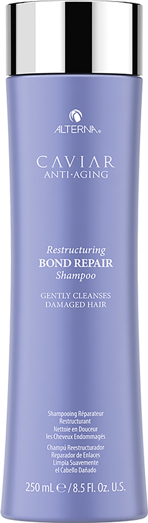 En lång, lila schampo-flaska med en silverkork, märkt "Caviar Anti-Aging" och "Bond Repair" för skadat hår.