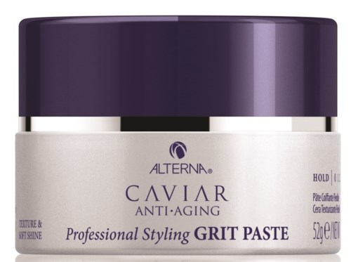 Förpackning av Alterna Caviar Anti-Aging stylingpasta, med lila lock och vit kropp. Den främjar textur, glans och anti-aging för hår.