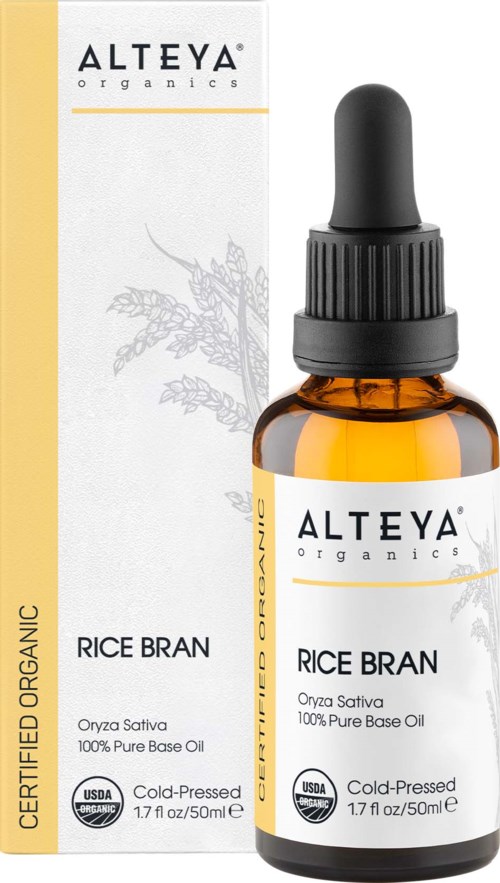 Brązowa butelka i opakowanie oleju z otrębów ryżowych Alteya Organics, z kroplomierzem i etykietą, na białym tle.