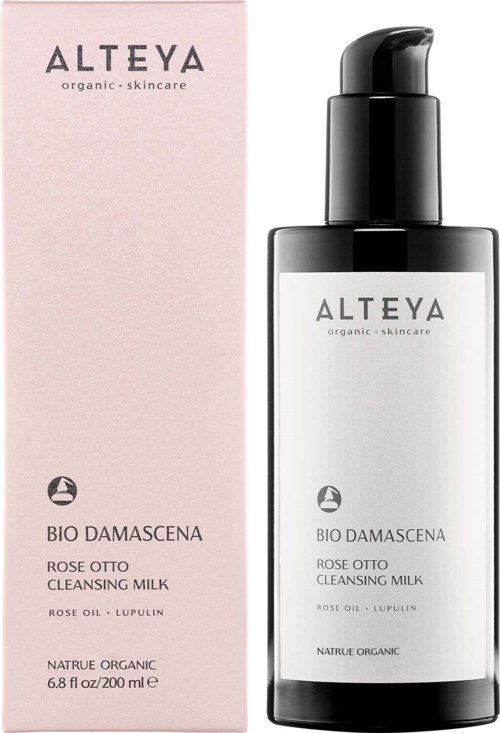 Produkt do pielęgnacji skóry z różowym opakowaniem i czarno-białą butelką z napisem 'ALTEYA Bio Damascena Cleansing Milk'.