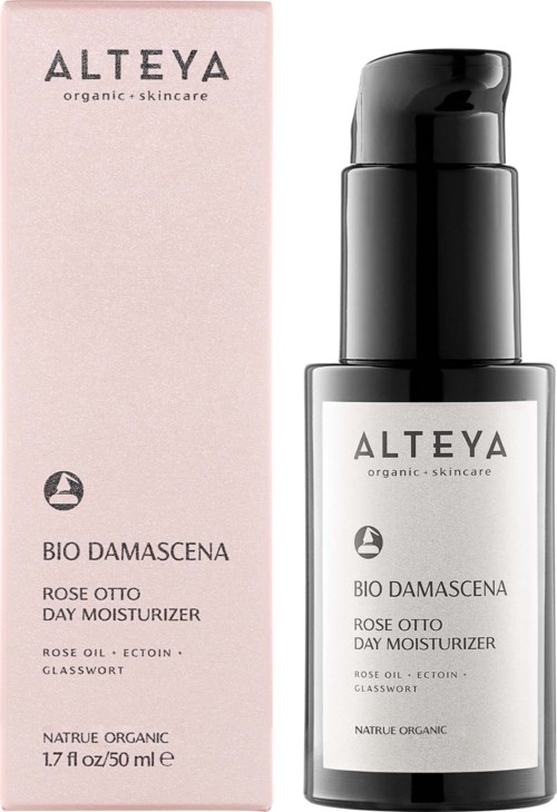 Czarna butelka z pompką marki Alteya organic skincare krem do dnia z różą obok różowego pudełka z informacjami o produkcie.