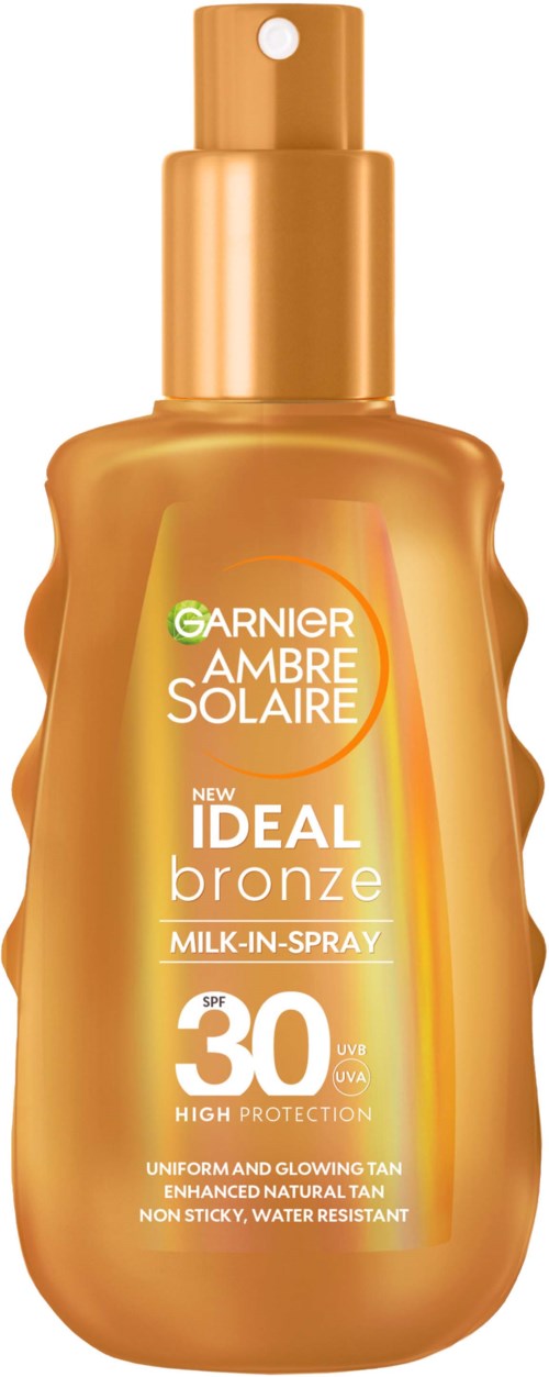 Eine bronzefarbene Sprühflasche mit 'Garnier Ambre Solaire Ideal Bronze' bietet hohen Sonnenschutz.