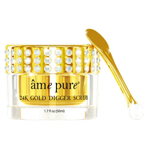 Luksuriøs gull- og krystallkrukke med hudpleieprodukt og en gullskje, merket 'âme pure 24K Gold Digger Scrub.'