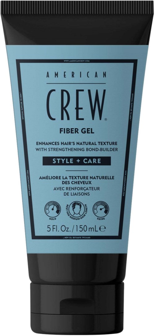 Een blauwe en zwarte tube American Crew Fiber Gel voor haar, met tekst over voordelen en grootte.
