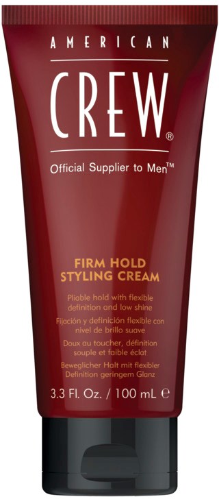 En röd tub med American Crew stylingkräm för män. Den är 3,3 fl oz (100 mL).