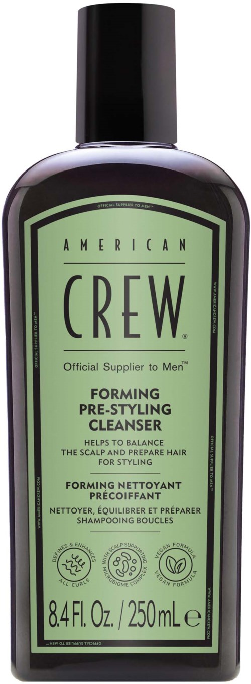 Grøn flaske af American Crew pre-styling rense med sort låg, 8,4 oz, hjælper med at balancere hovedbund og hår.