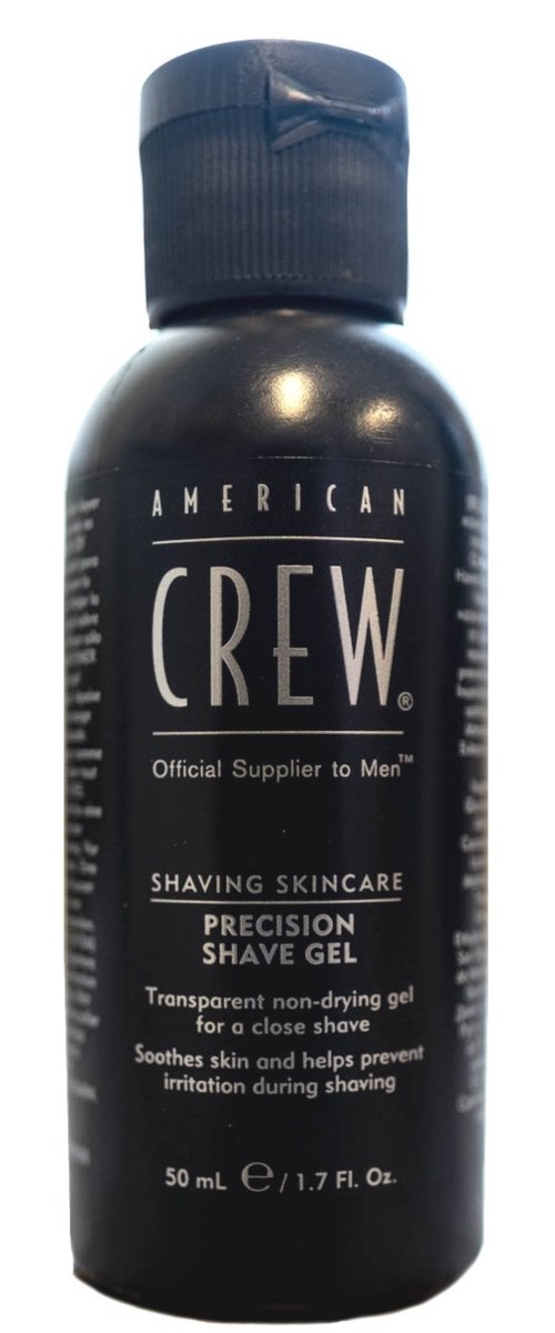 En svart flaska med American Crew rakgel med blå lock, etiketten visar produktuppgifter och storlek, 50 ml.