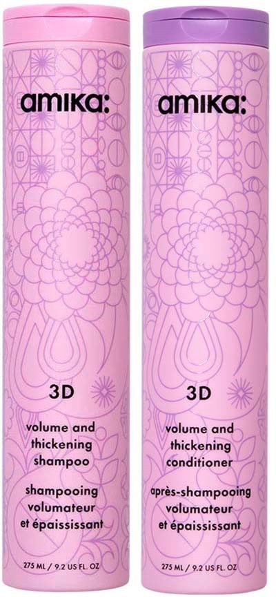 Two tall pink and purple bottles labeled 'amika 3D' for volume and thickening shampoo and conditioner.