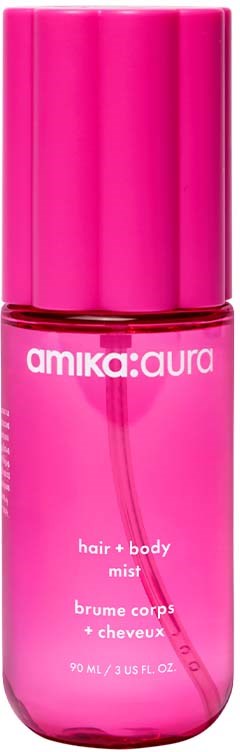 Pinkfarbige Flasche mit Haar- und Körperspray, weiße Schrift und pinker Kappe.