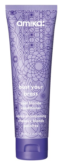 En lila tub med Amika Cool Blonde Conditioner med abstracta linje- och prickmönster och vitt text.