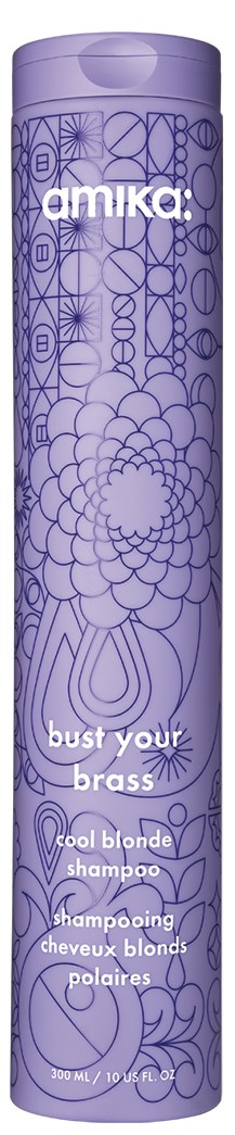 En lång lila burk med intrikata linjemönster, med Amika-logotyp och text om blond schampo. 