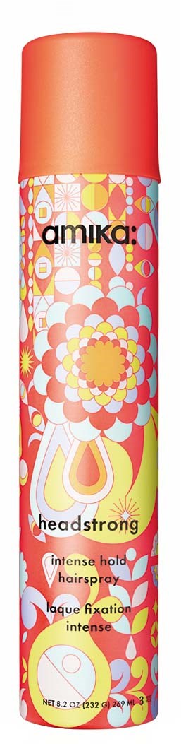 Długa puszka spray do włosów Amika Headstrong z jasnym wzorem kwiatowym i geometrycznym, pomarańczowa nakrętka i szczegóły produktu.