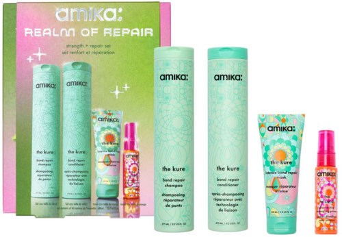 Set av hårreparationsprodukter inklusive schampo, balsam och styling spray med färgglad förpackning.