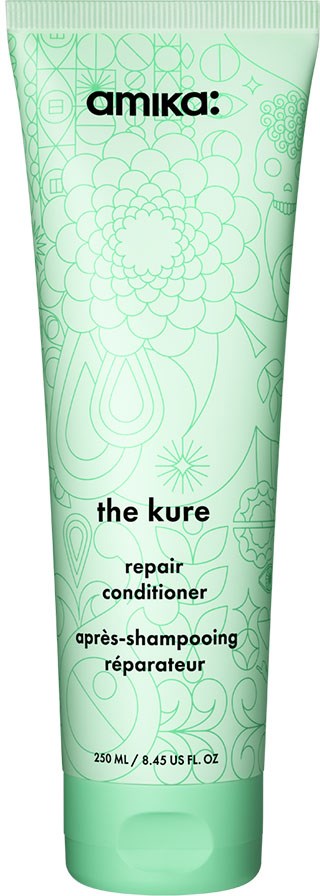 En grön tub märkt 'amika: the kure repair conditioner'. Den har ett blommönster och innehåller 250 ml balsam.