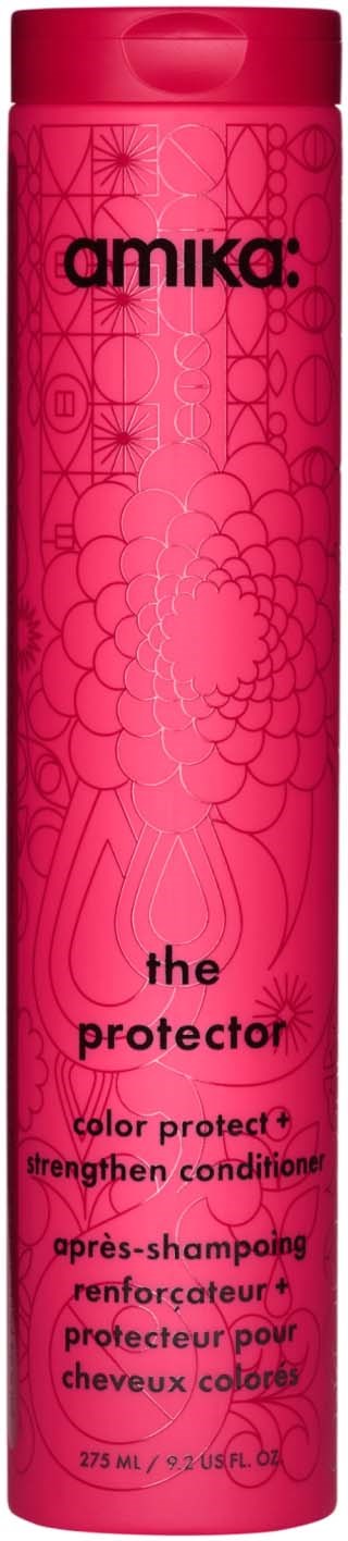 En lang rosa shampoo-flaske med sort tekst og abstrakte linjearteknikker til Amika the protector color protect shampoo.
