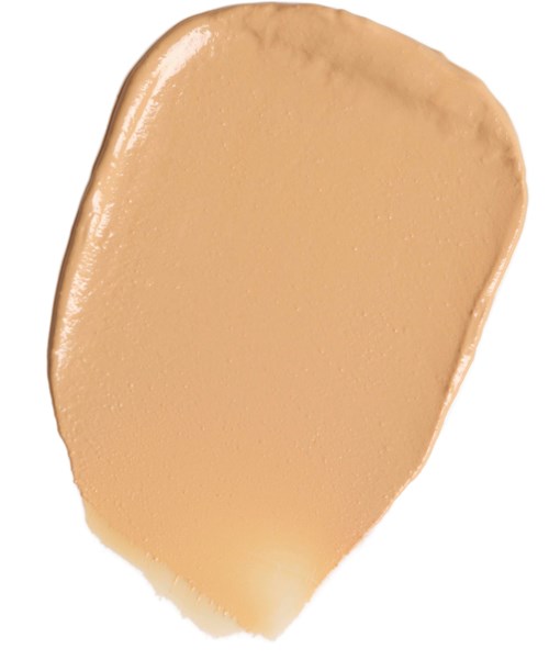 En beige væske av flytende foundation med glatt, litt skinnende overflate.