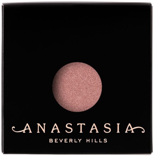 En svart låda med en rosa, glänsande rund form och orden "Anastasia Beverly Hills" skrivna under.