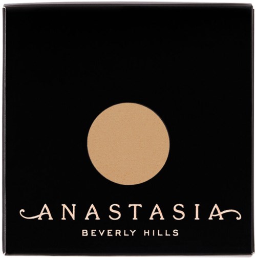 Svart box med en gyllene cirkel i mitten och orden 'Anastasia Beverly Hills' nedan.