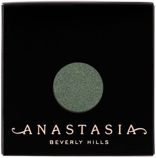 En svart låda med en grön ögonskugga cirkel och orden 'Anastasia Beverly Hills'.
