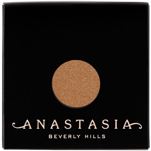 En svart ask med ett runt, skimrande, guldögonskugga och orden "Anastasia Beverly Hills".
