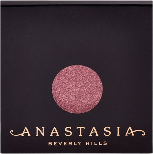 En mörk bakgrund med en rosa glittrande cirkel och texten 'Anastasia Beverly Hills' under.