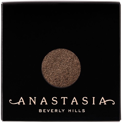 Svart box med en bronsglittrande cirkel och texten 'Anastasia Beverly Hills'.