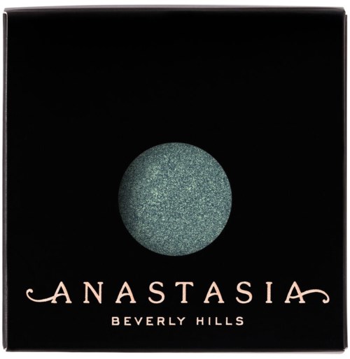En svart låda med en grönaktig rund design och orden "Anastasia Beverly Hills" i fin stil.