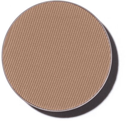 Det här är en rund kompakt med beige pulver inuti, används för smink.