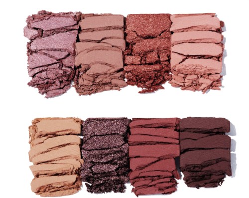 En samling av krossade, pressade eller trasiga makeup-puder i olika nyanser, arrangerade i två rader.