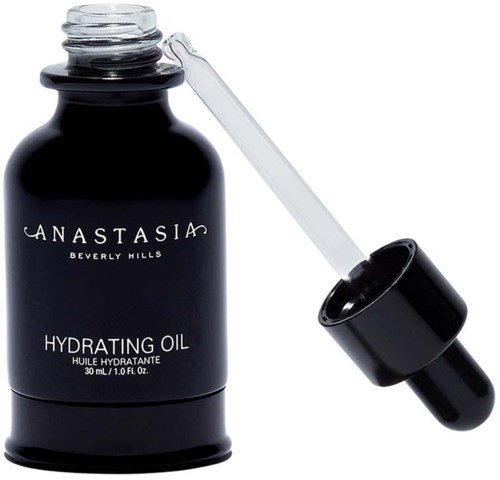 En svart flaska märkt 'Hydrating Oil' med en droppepenna ovanpå.