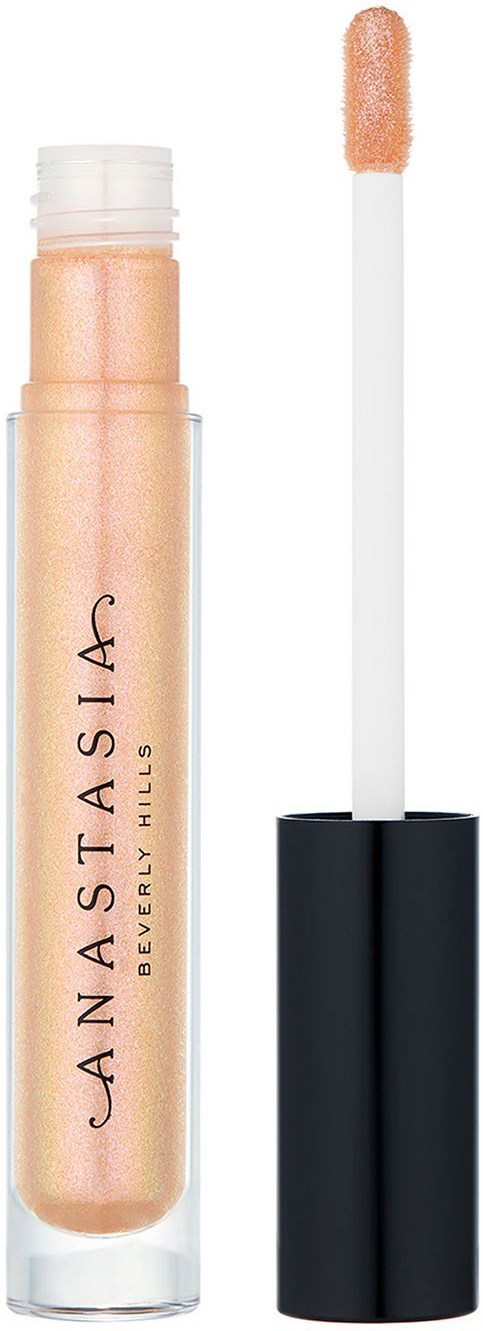 A lip gloss tube with peach-colored gloss and an applicator stick showing. The brand is Anastasia Beverly Hills.