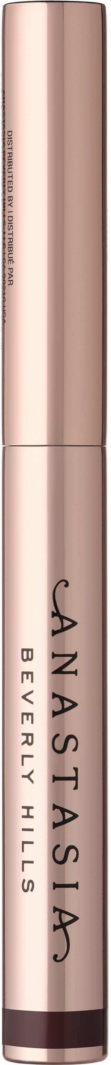 En slank beige tube med svarte og brune detaljer, merket "Anastasia Beverly Hills," sannsynligvis et kosmetikk- eller skjønnhetsprodukt.