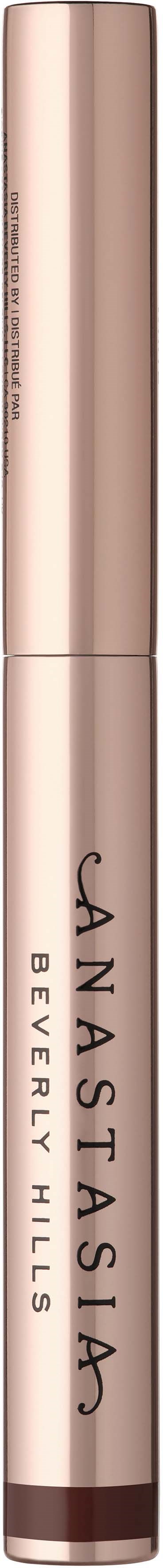 Et sminkeprodukt med en rosa-beige tube og svart tekst, del av Beverly Hills-kollektionen.
