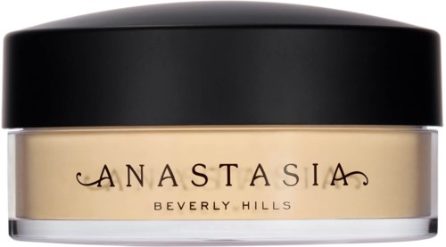 A jar of makeup or skincare product with a black lid and cream-colored label. The label says 'Anastasia Beverly Hills.'