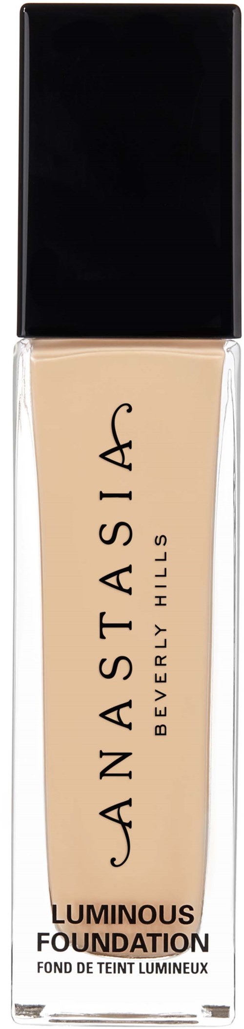 Eine beigen flüssigen Foundation in einer transparenten Glasflasche mit schwarzem Deckel, beschriftet Anastasia Beverly Hills Luminous Foundation.