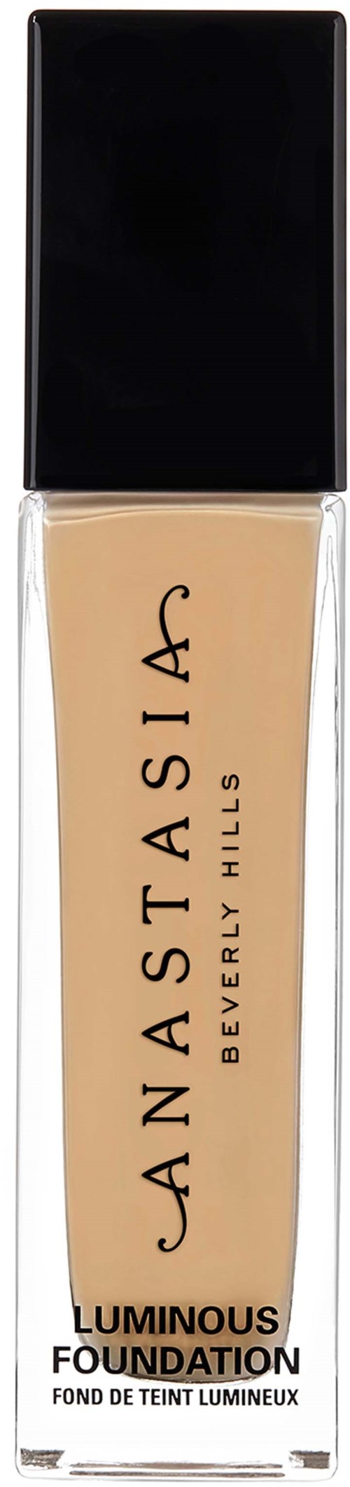 Eine Flasche Anastasia Beverly Hills leuchtende Foundation mit schwarzem Deckel und klarem Glas mit beige Flüssigkeit.