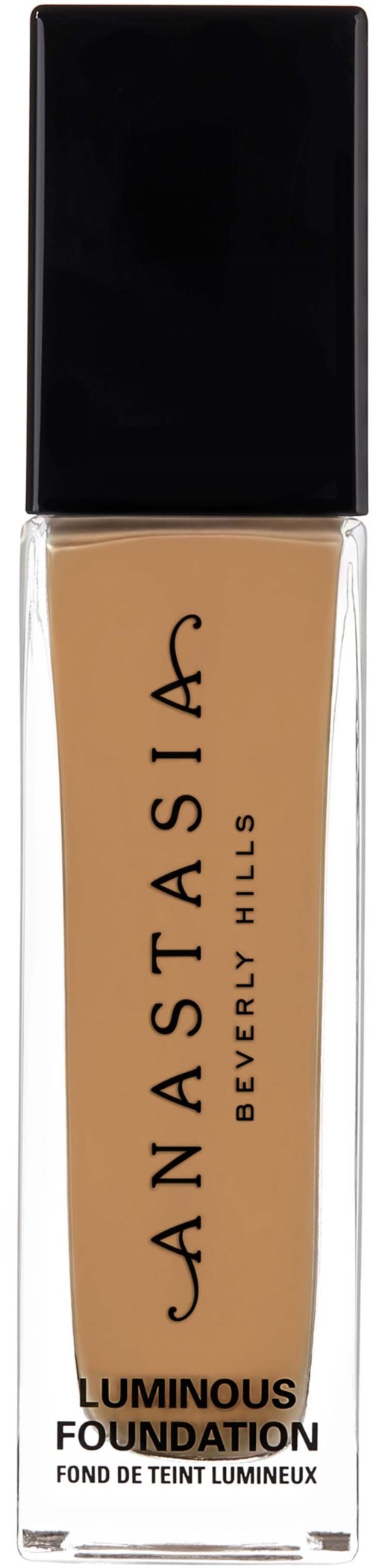 En flaska av foundation med svart lock och beige vätska, märkt Anastasia Beverly Hills Luminous Foundation.