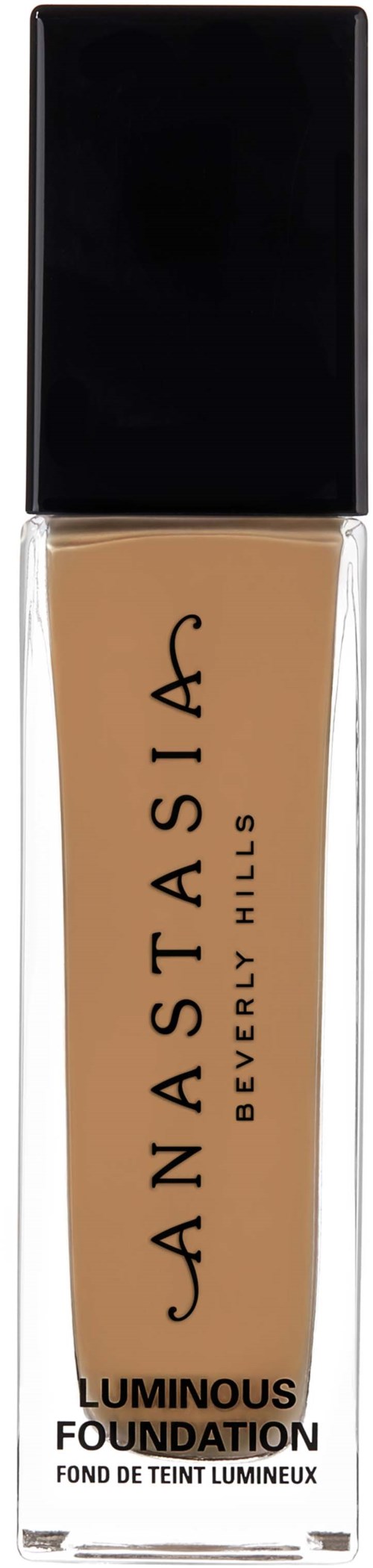 En flaska av Anastasia Beverly Hills luminös foundation med svart lock, beige vätska inuti.