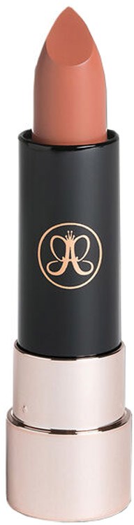 A beige lipstick with a black and gold tube and a logo on the outside.